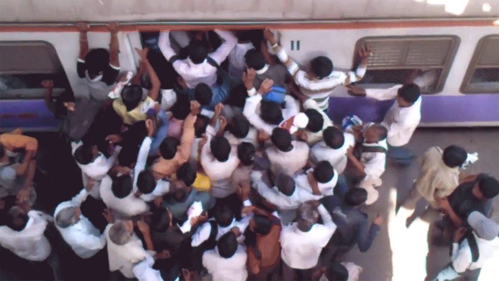 Waiting-At-Bus-Stand-In-Queue-For-Ticket.gif